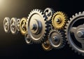 Interlocking metallic gears of various sizes and materials, including silver and brass, are aligned Royalty Free Stock Photo