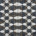 Interlocking stone pavement featuring a geometric pattern of curves and Royalty Free Stock Photo