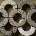 Interlocking stone rings are arranged in Royalty Free Stock Photo