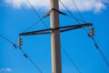 Intermediate, transmission line costs against the sky close-up