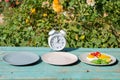 Intermittent fasting concept with empty colorful plates. Time to lose weight , eating control or time to diet concept. Royalty Free Stock Photo