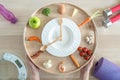 Intermittent fasting IF diet concept with 16:8 hour clock timer for skipping meal and eating keto low carb, high fat food Royalty Free Stock Photo