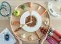 Intermittent fasting IF and keto diet concept with hour clock timer for skipping meal, eating ketogenic food low carb Royalty Free Stock Photo