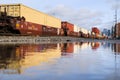 Intermodal train reflecting in a puddle in Seattle