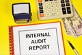 Internal audit report. Text label in the financial document on the folder Royalty Free Stock Photo