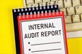 Internal audit report - a text label in the planning notebook. Royalty Free Stock Photo