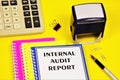 Internal audit report. A text label in the planning notebook. Royalty Free Stock Photo