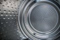 Internal closeup view of dryer stainless steel drum.