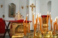 Internal furniture and candles of an orthodox temple 5