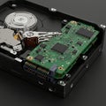 Internal hard drive (HDD) with the cover removed, revealing components. Visible are Royalty Free Stock Photo