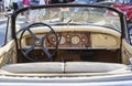 Internal view of the instruments and dashboard of the luxury vintage car model Jaguard XK150 manufactured by British Jaguard