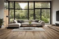 internal view of a modern living room with wood flooring overlooking on the garden Royalty Free Stock Photo