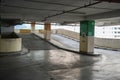 An internal view of a multi-level parking structure showing the entrance or exit ramp for vehicles. Royalty Free Stock Photo