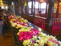 Internal view temple of Tooth of Buddha with flowers