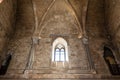 Internal wall with arches, columns and windows of the Catel del Monte di Andria Italy