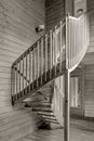 Internal wooden spiral staircase in a yellow monochrome tonality Royalty Free Stock Photo