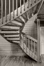 Internal wooden spiral staircase in a yellow monochrome tonality Royalty Free Stock Photo