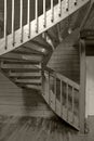 Internal wooden spiral staircase in a yellow monochrome tonality Royalty Free Stock Photo