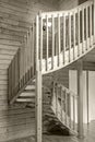 Internal wooden spiral staircase in a yellow monochrome tonality Royalty Free Stock Photo