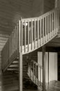 Internal wooden spiral staircase in a yellow monochrome tonality Royalty Free Stock Photo