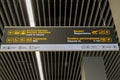 International airport Khrabrovo named after Empress Elizabeth Petrovna, black board hanging from top with yellow directions signs