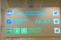 International Airport sign to Gates and baggage claims and toilette Royalty Free Stock Photo