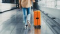 Asian beautiful woman with luggage and walking in airport Royalty Free Stock Photo