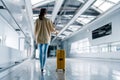 Asian beautiful woman with luggage and walking in airport Royalty Free Stock Photo