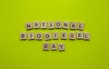 International Biodiesel Day, World Biofuels Day, minimalistic banner, inscription in wooden letters on a yellow