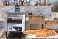 International buffet with assorted bread and toast line and toaster on table in breakfast buffet at kitchen in hotel. Royalty Free Stock Photo