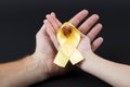 International Children`s Day Cancer. Yellow ribbon Royalty Free Stock Photo