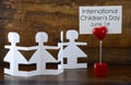 International Childrens Day concept with paper dolls.