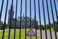 The International Court of Justice in The Hague for the fence with the inscription Attention, painted