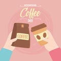 International day of coffee, hands with package and disposable cup
