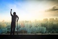 International Day of Democracy concept: disabled person with crutches silhouette at city background Royalty Free Stock Photo