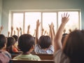 International Day of Education concept. Interactive classroom education. Students raise hands to answer question during class at