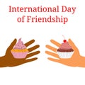 International Day of Friendship. 30 July. Hands of people of different nationalities. They stretch out to each other, give cake. Royalty Free Stock Photo