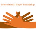 International Day of Friendship. 30 July. Hands of people of different nationalities. They stretch to make a handshake. Name of th Royalty Free Stock Photo
