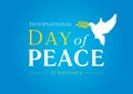 International Day of Peace with dove, olive branch and text