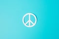 International Day of Peace. white paper Peace symbol on blue background. Freedom, Hope, World Peace day 21 September and Nuclear