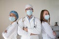 International doctor team. Hospital medical staff. Mixed race Asian and Caucasian doctor and nurse meeting. Coronavirus outbreak. Royalty Free Stock Photo