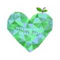 International Earth Day. Inscription. 22 April. Green polygonal heart. Vector illustration. Royalty Free Stock Photo