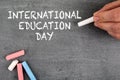 International Education Day, 24 January. Gray chalk board