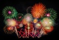 International fireworks festival display at night. Variety of colorful fireworks in holidays celebration isolated on black. Happy Royalty Free Stock Photo