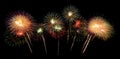 International fireworks festival display at night. Variety of colorful fireworks in holidays celebration isolated on black. Happy Royalty Free Stock Photo