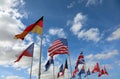 international flags germany usa uk and others on blue sky and wh
