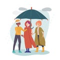 International friendship. Multicultural friends stand together under one umbrella. Rainy day, happy man woman in autumn Royalty Free Stock Photo