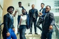 International group of nine african american and indian people having a rest after brain storm in big office Royalty Free Stock Photo