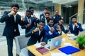 International group of nine african american and indian people having a rest after brain storm in big office Royalty Free Stock Photo