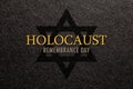 International Holocaust Remembrance Day. Star of David on a black background.